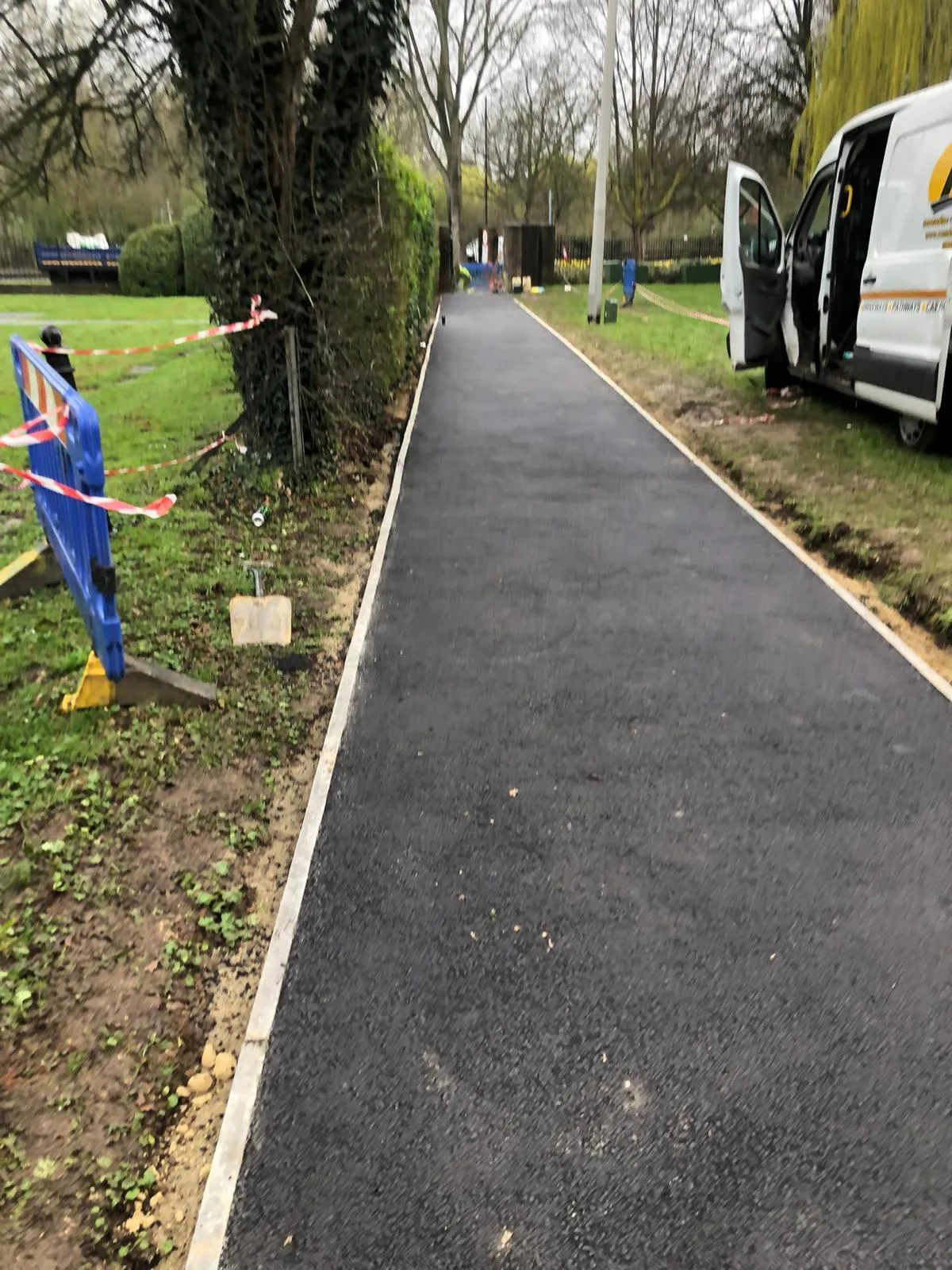 A new park footpath, with the crew finishing the edges