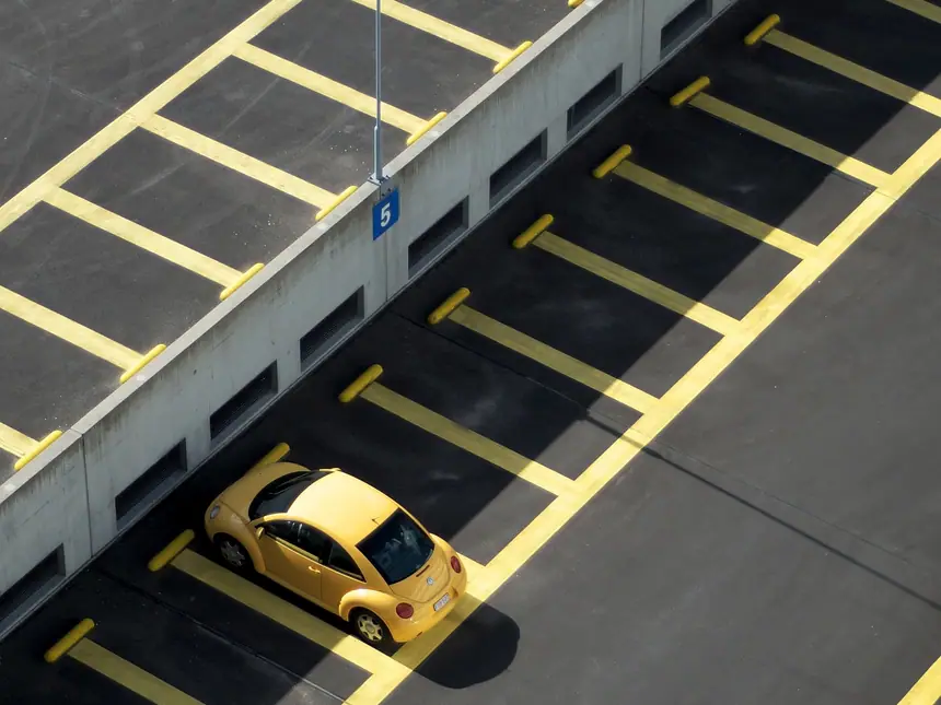 Yellow markings on a multi-storey parking deck
