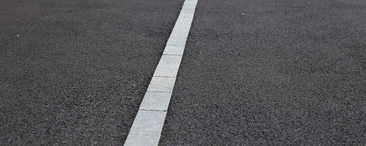 A marked edge line on a resurfaced path — Path Resurfacing in Bromley by Meads Resurfacing