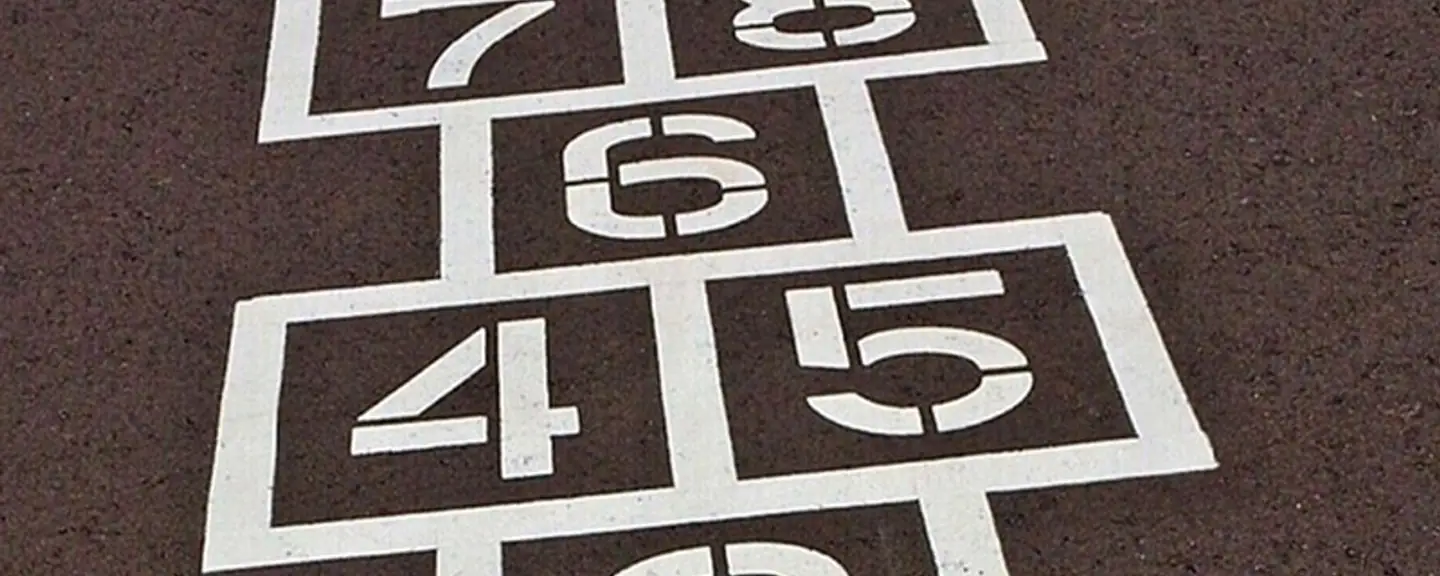A resurfaced school play area with games markings — Playground Resurfacing in Teddington by Meads Resurfacing