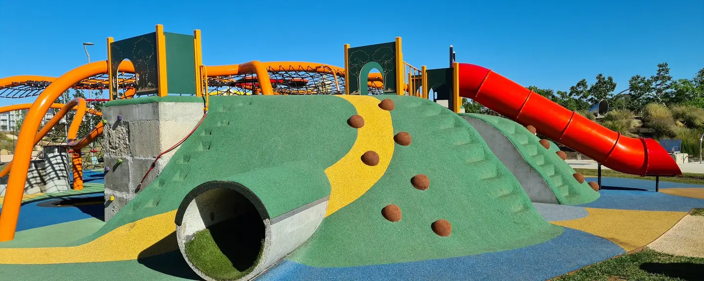 A school playground with coloured play surfacing — Playground Resurfacing in Ramsgate by Meads Resurfacing