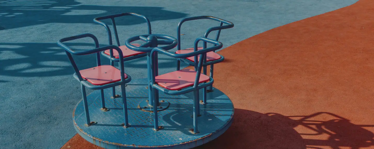 A coloured play surface in a public play area — Playground Resurfacing in Ruislip by Meads Resurfacing