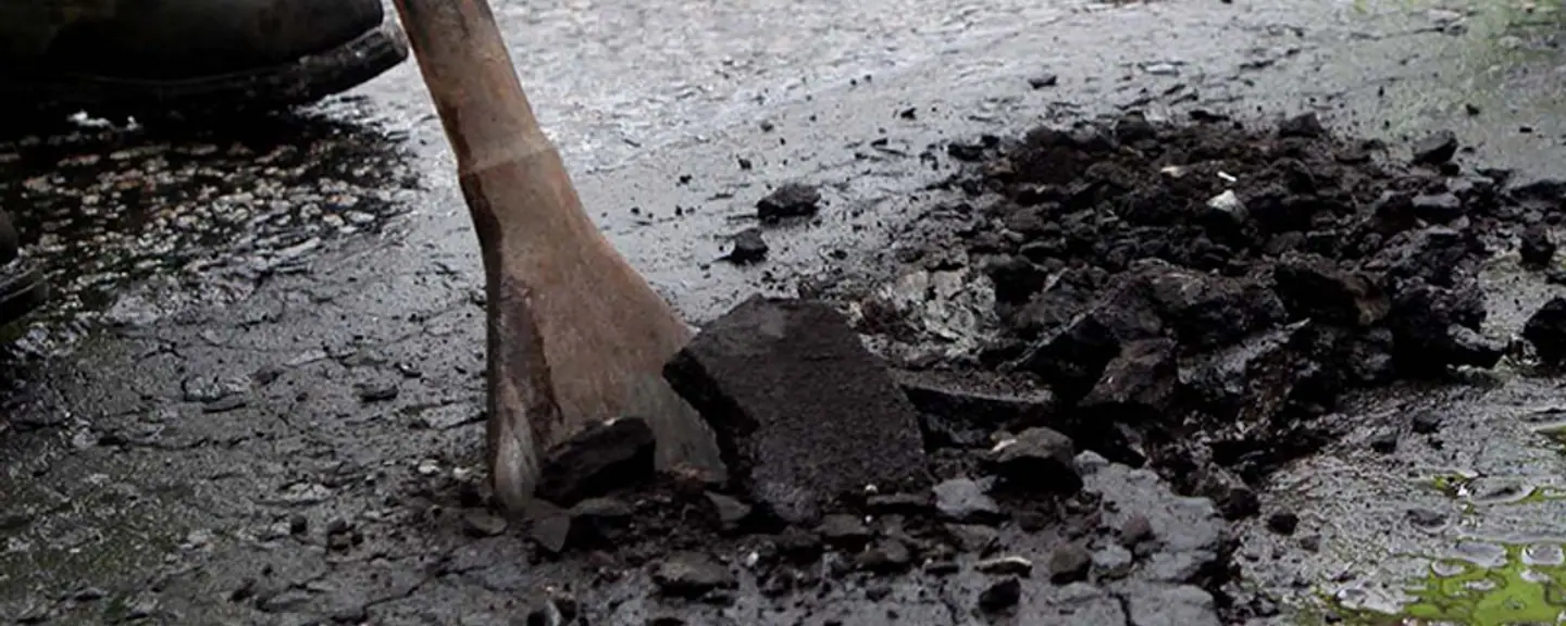 A plate compactor finishing a pothole repair — Pothole Repairs in Ramsgate by Meads Resurfacing