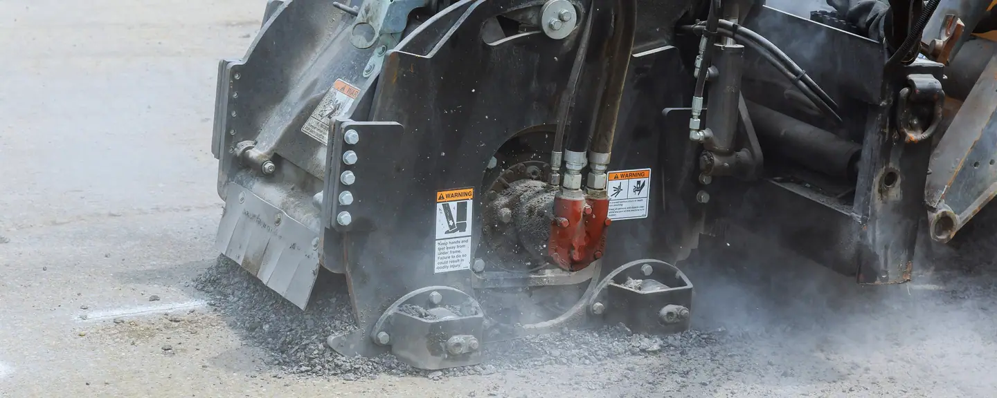 A milling machine planing out a failed surface — Pothole Repairs in Ruislip by Meads Resurfacing