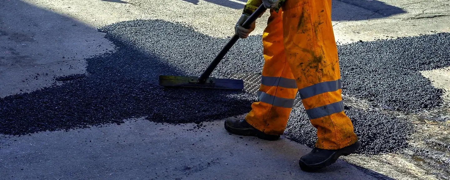 A road part-way through resurfacing — Road Resurfacing in Halstead by Meads Resurfacing