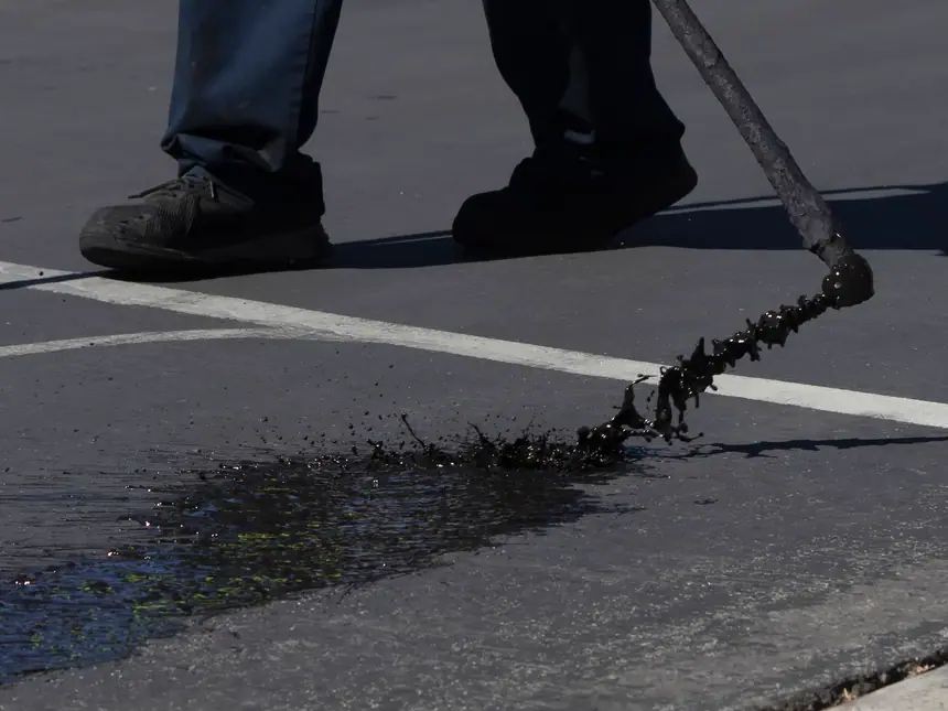 A freshly sealed asphalt surface