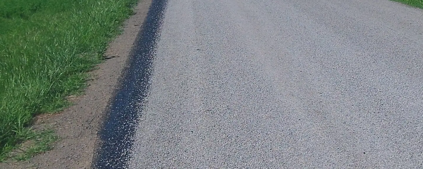 A tar and chip road surface — Surface Dressing in Broadstairs by Meads Resurfacing