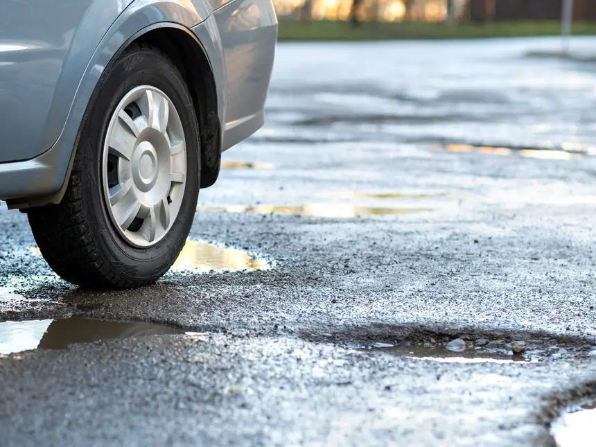 A resealed asphalt surface after repair