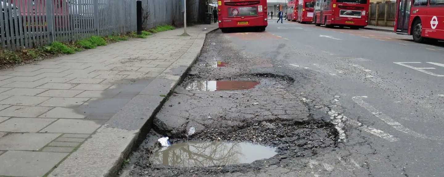 A pothole opened up ready for filling — Tarmac Asphalt Repairs in Putney by Meads Resurfacing