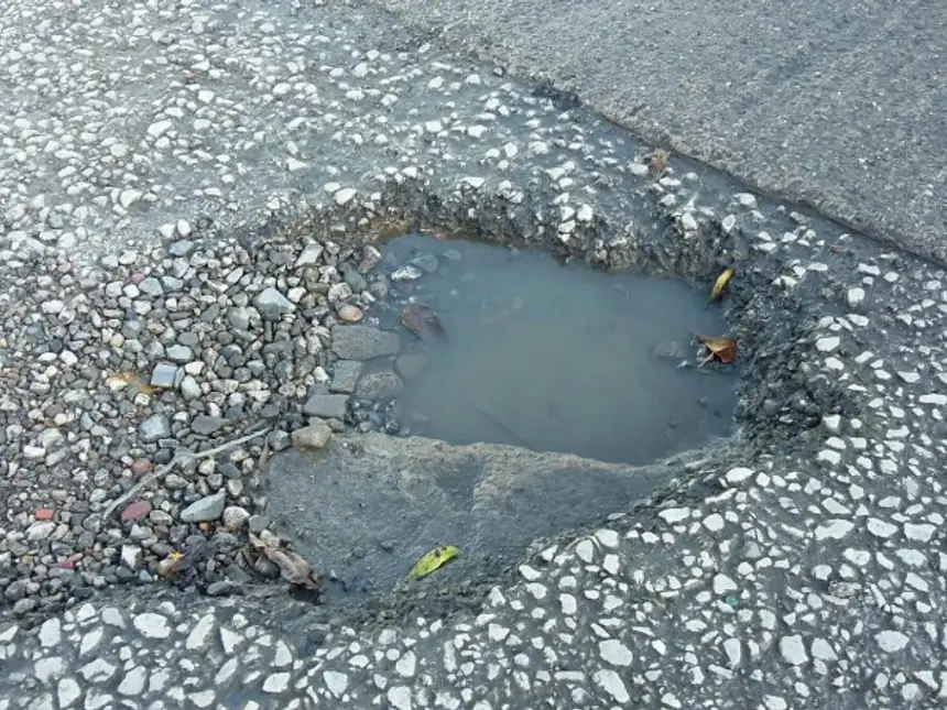 A completed asphalt repair