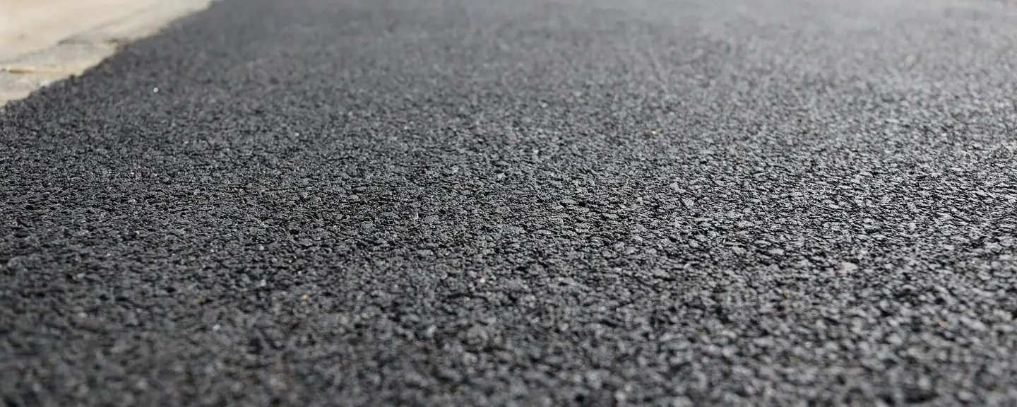 Tarmac run up to a boundary edge — Tarmac Contractors in Hammersmith by Meads Resurfacing