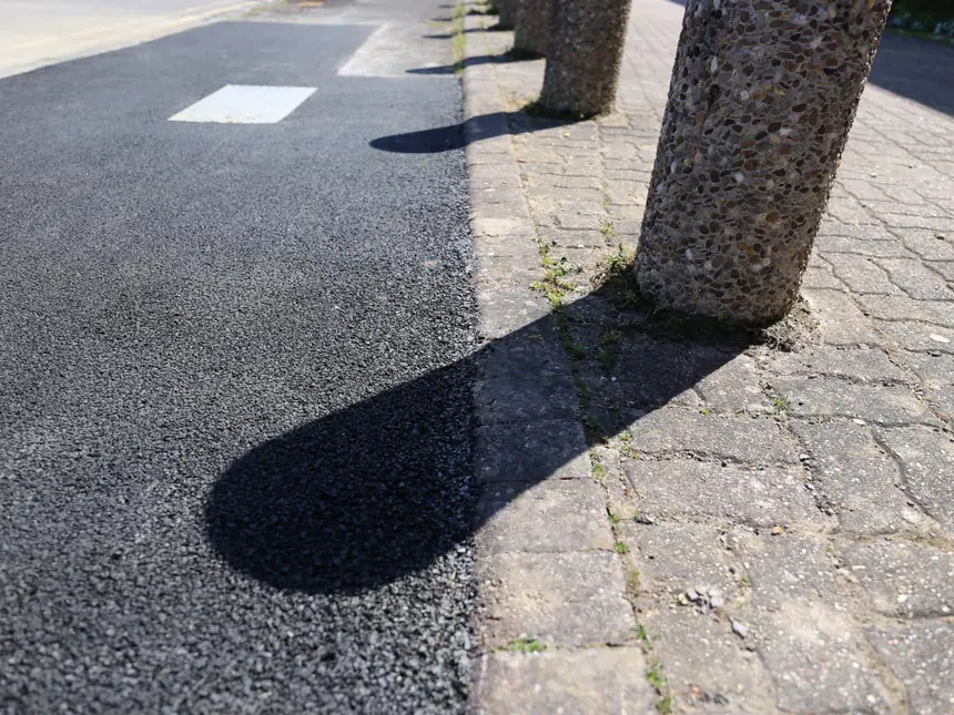 A close view of a compacted tarmac finish