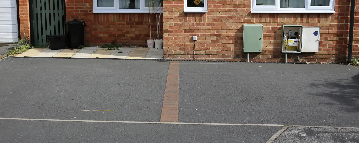 A tarmac driveway finished with edging — Tarmac Driveways in Bexley by Meads Resurfacing